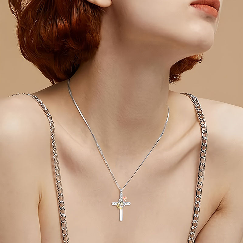 Elegant 925 silver cross pendant for women displayed on a model's neckline with a stylish chain