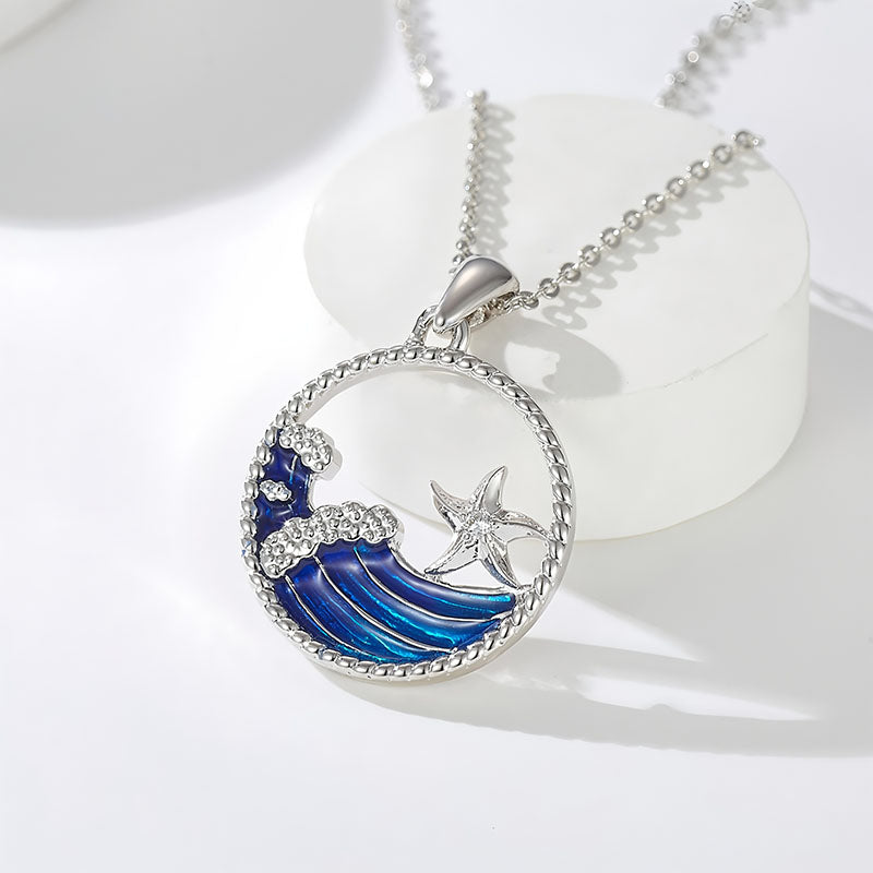 925 silver Hawaiian wave necklace featuring a blue wave design with a starfish charm