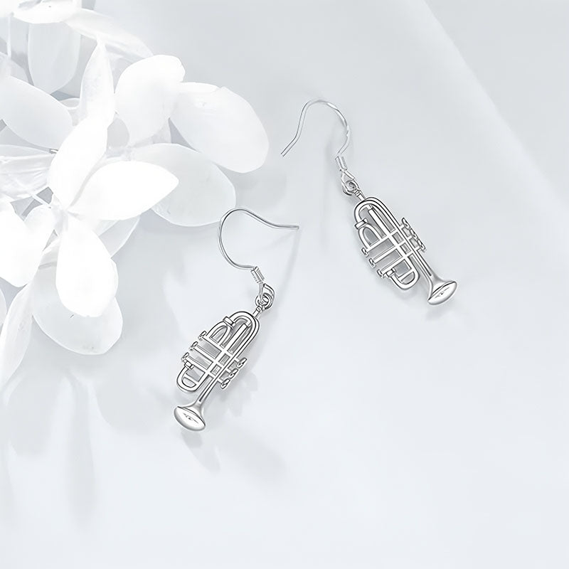 Origsoul 925 silver trumpet earrings with detailed charm design and hook closures on white background