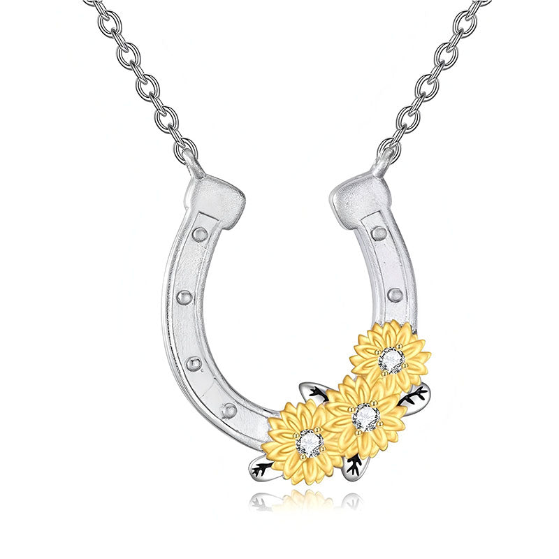 Origsoul lucky horseshoe necklace with silver horseshoe and gold sunflower accents with crystal centers