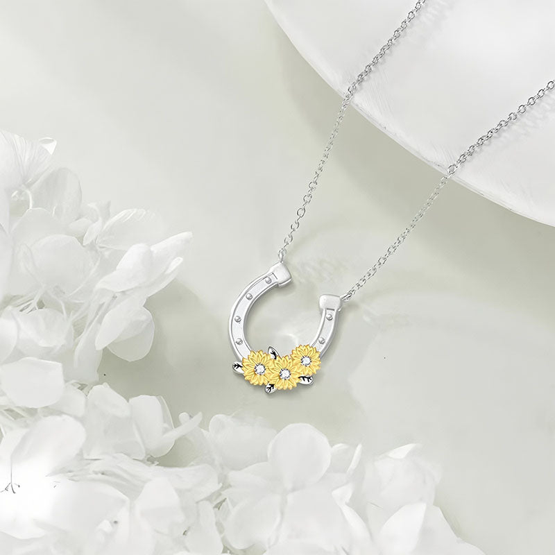 Origsoul lucky horseshoe necklace with yellow flower accents on silver chain jewelry
