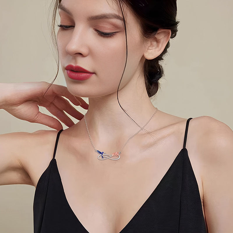 Elegant bluebird rose pendant necklace for women showcasing a delicate design on a model