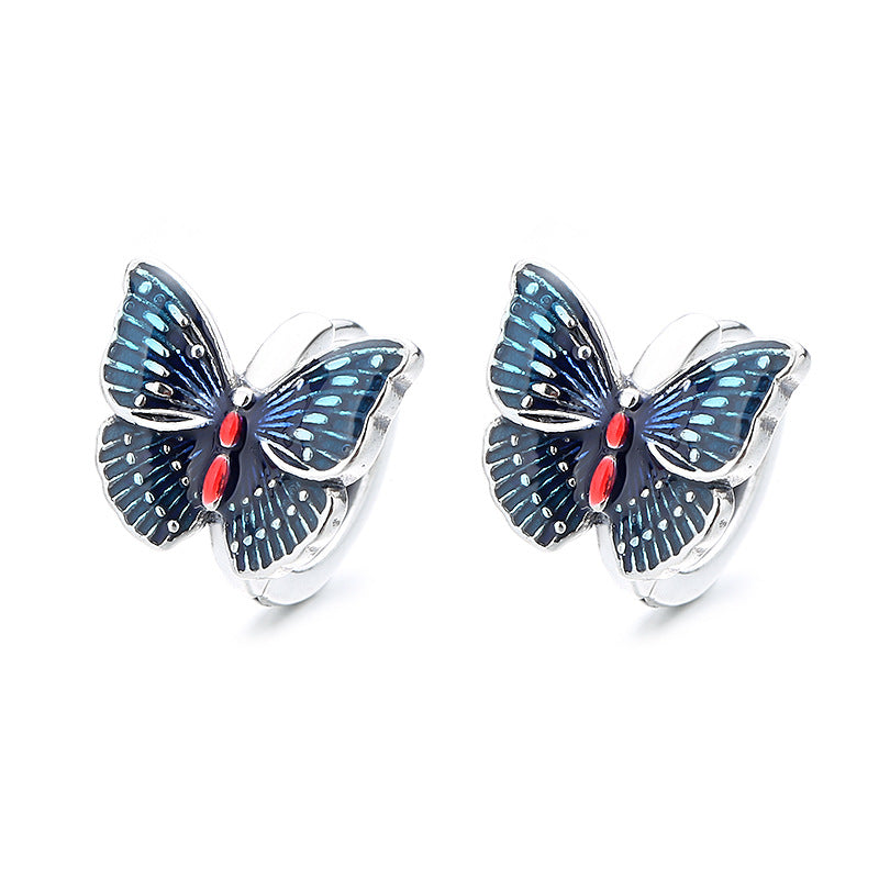 Origsoul butterfly earrings for women with blue and red detailed wings in insect jewelry style