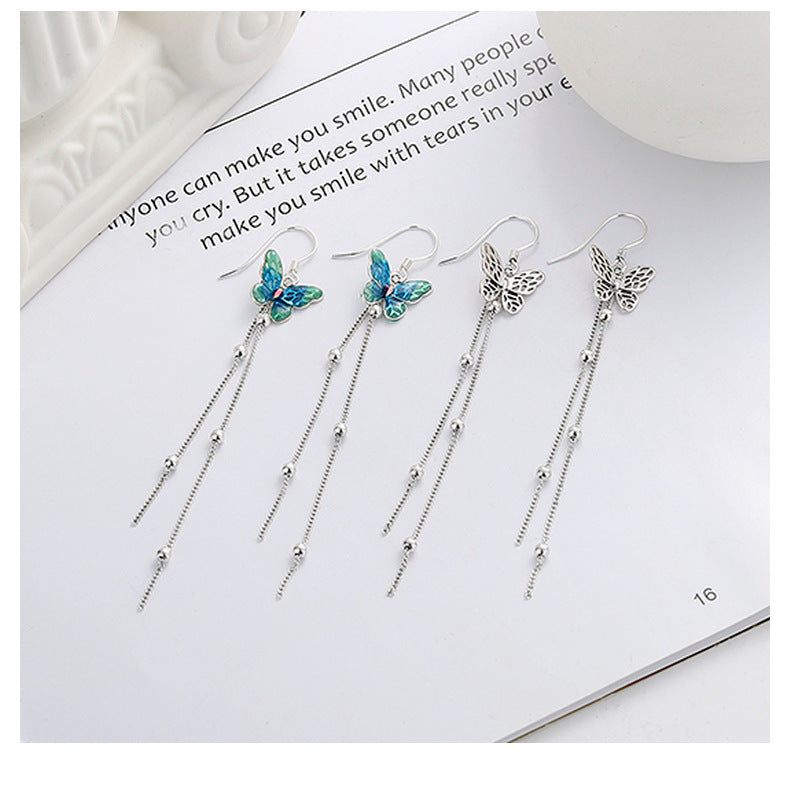 Origsoul butterfly tassel earrings with delicate silver chains and detailed butterfly designs
