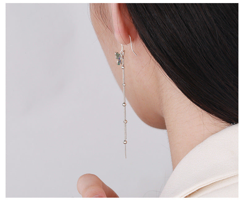 Origsoul butterfly tassel earrings featuring delicate insect design with long chain and beads