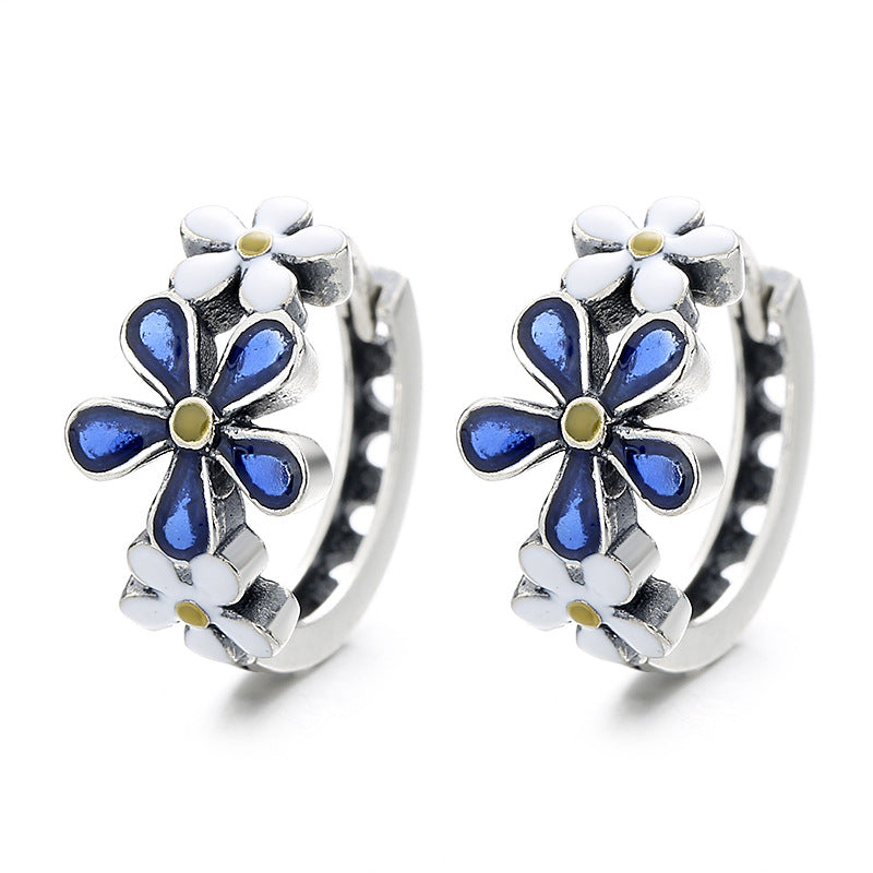 Origsoul daisy hoop earrings for women with blue and white enamel flower design in silver