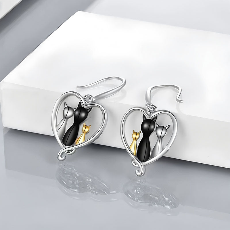 Origsoul family cat earrings with silver heart frames and three cats in black gold and silver tones