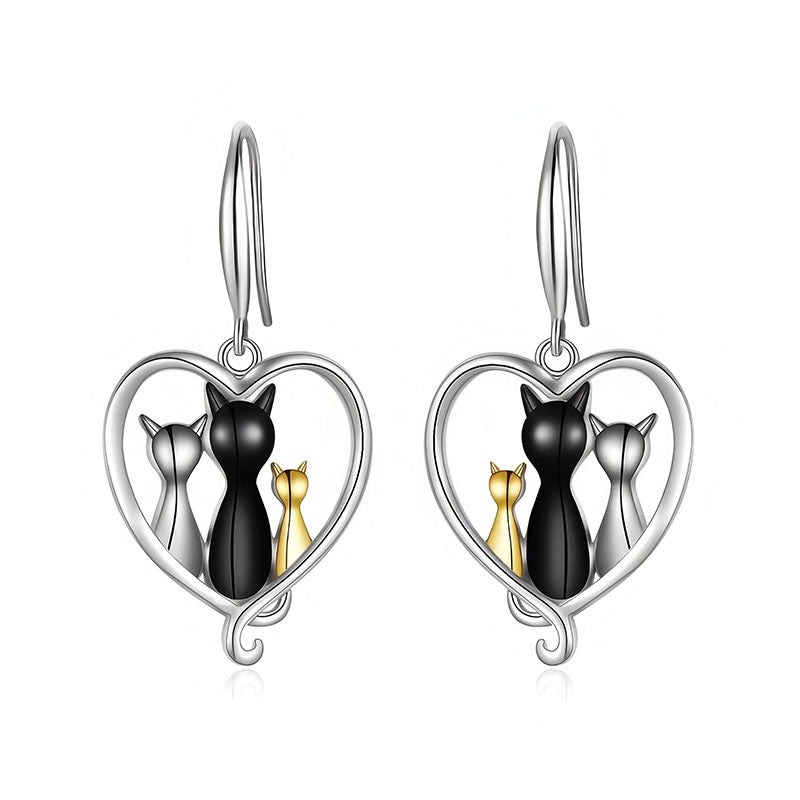 Origsoul family cat earrings featuring three cats in black, silver, and gold inside a heart-shaped frame