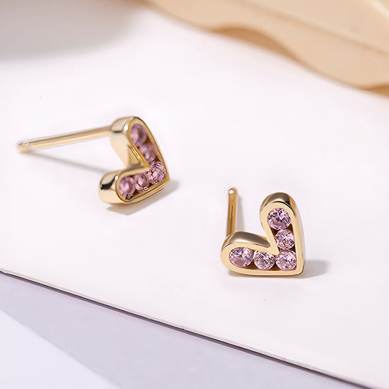 Origsoul gold heart stud earrings with pink gemstones in a delicate and elegant design
