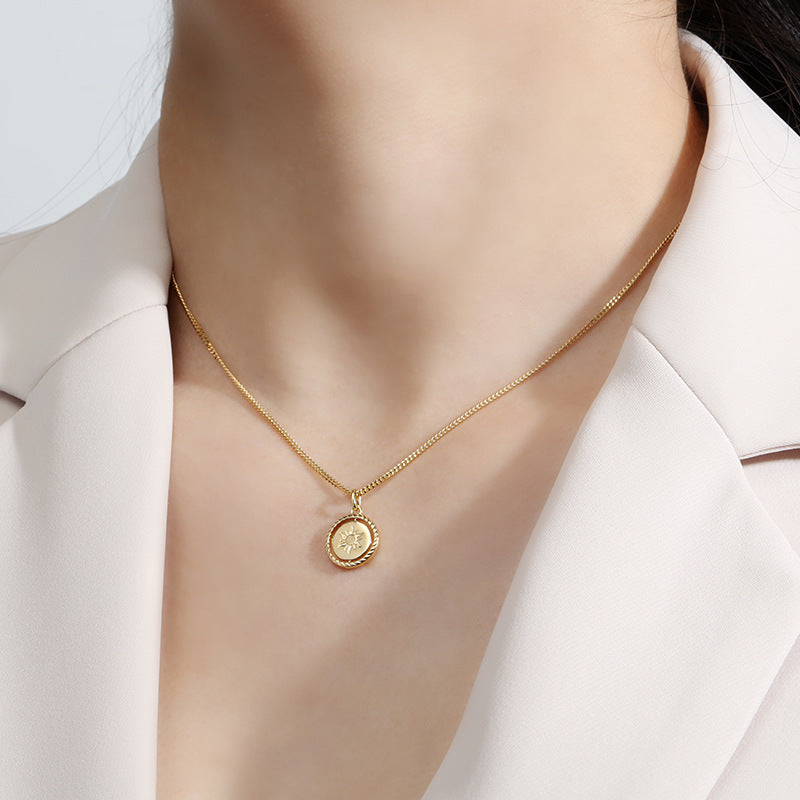 Origsoul gold sun charm jewelry necklace worn on neck with delicate chain and round pendant