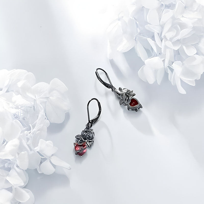 Gothic black rose earrings with intricate design and red accents for a stylish look