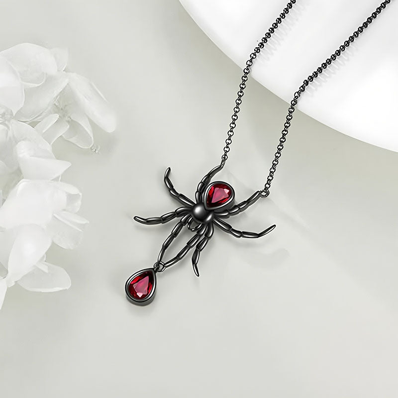 Origsoul gothic spider necklace with black metal and red gemstone accents on a chain