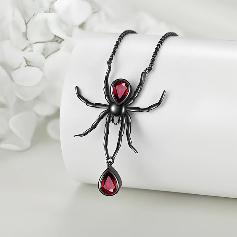 Origsoul gothic spider necklace in black with red gemstone accents on a chain
