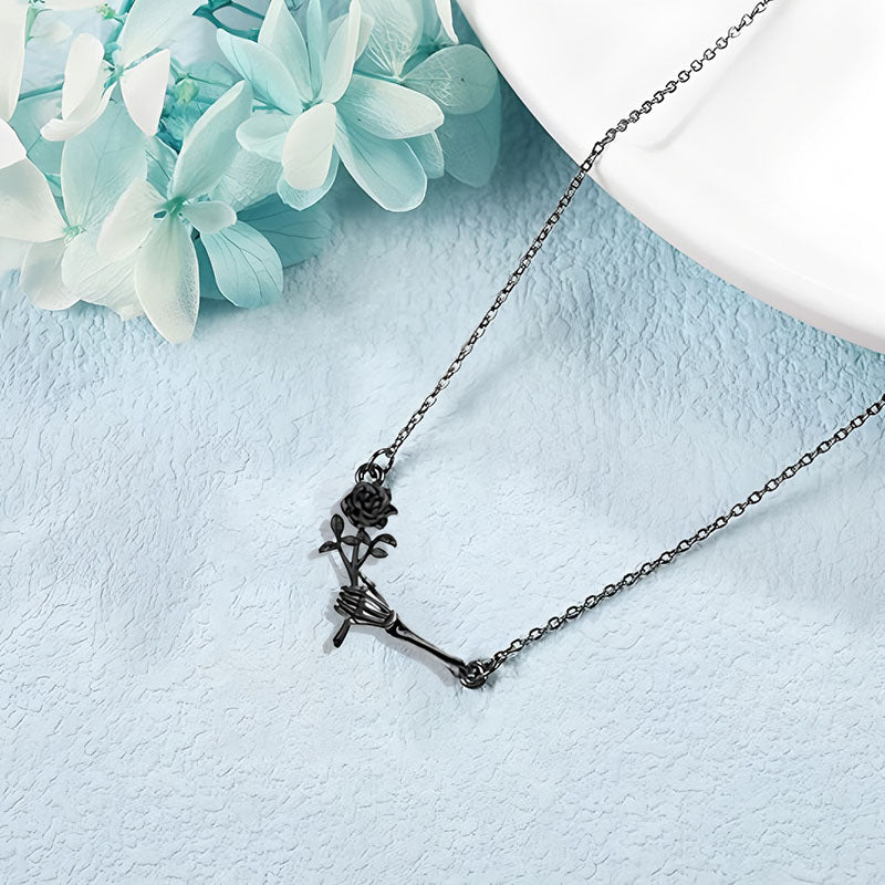 Origsoul black pendant necklace with skeleton hand holding rose Halloween gothic jewelry for women