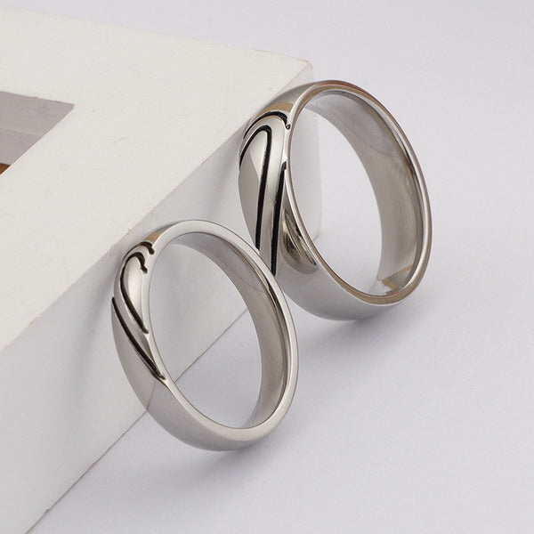 Origsoul silver heart shaped couple rings set with smooth polished finish on white background