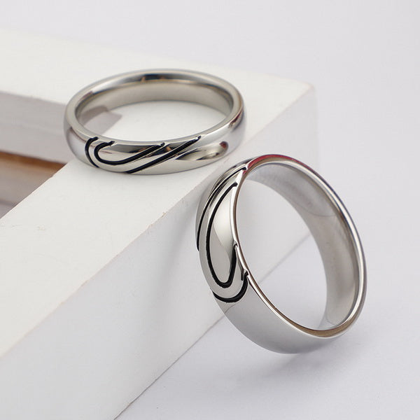 Origsoul silver heart shaped couple rings with sleek polished finish on white background