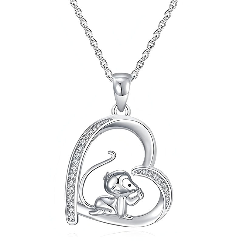 Origsoul heart shaped necklace featuring a 925 sterling silver monkey pendant with cubic zirconia accents