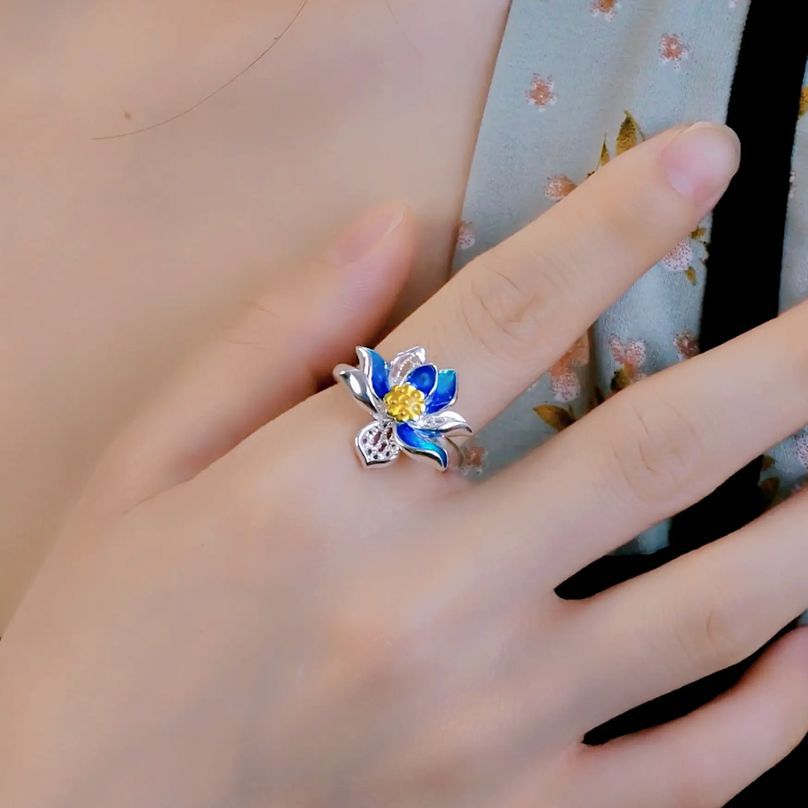 Origsoul March birth flower ring with blue and yellow floral design on hand