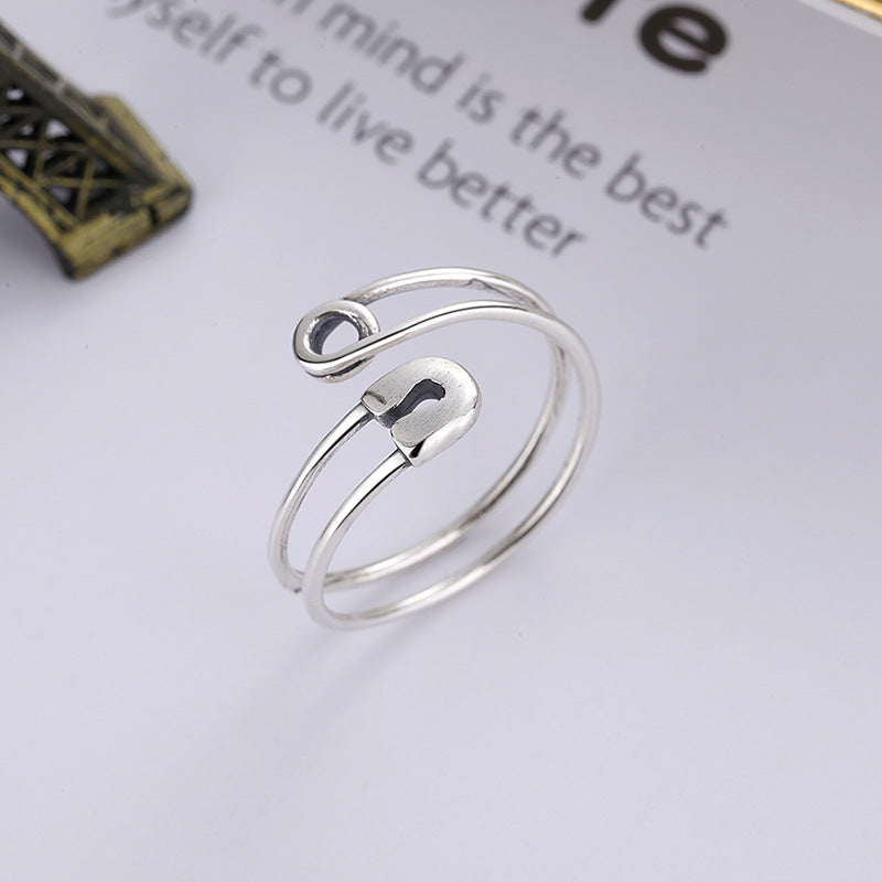 Origsoul modern silver statement ring with unique open design and smooth finish