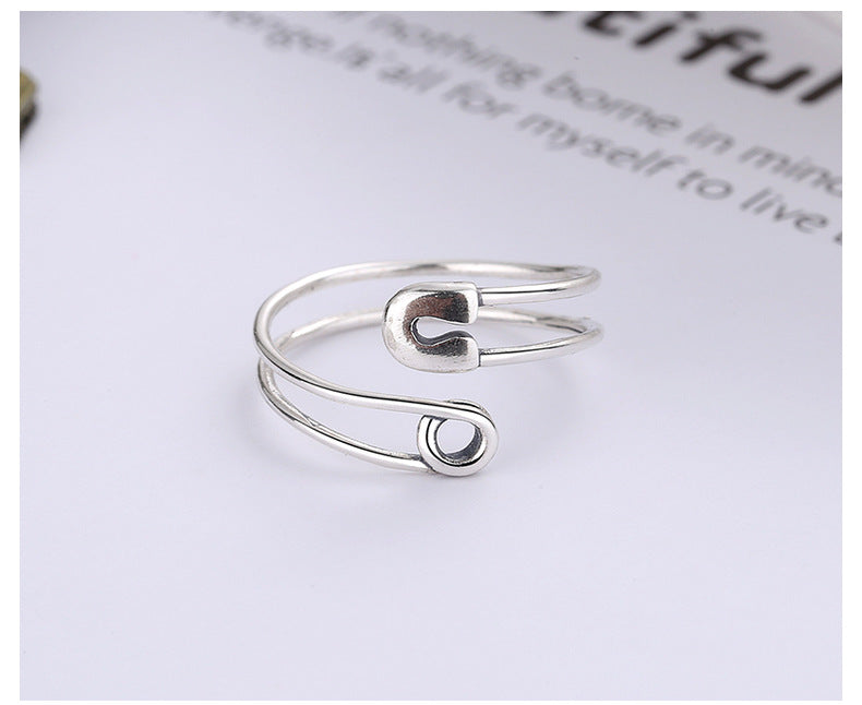 Origsoul modern silver statement ring with open design and minimalist style on white background