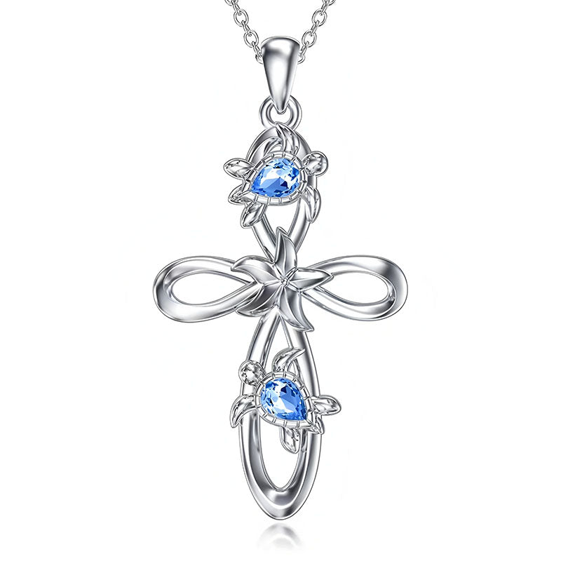 Origsoul ocean cross pendant necklace with silver finish and blue gemstone turtle accents