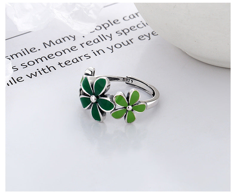 Origsoul October birth flower ring with green enamel flowers on sterling silver band