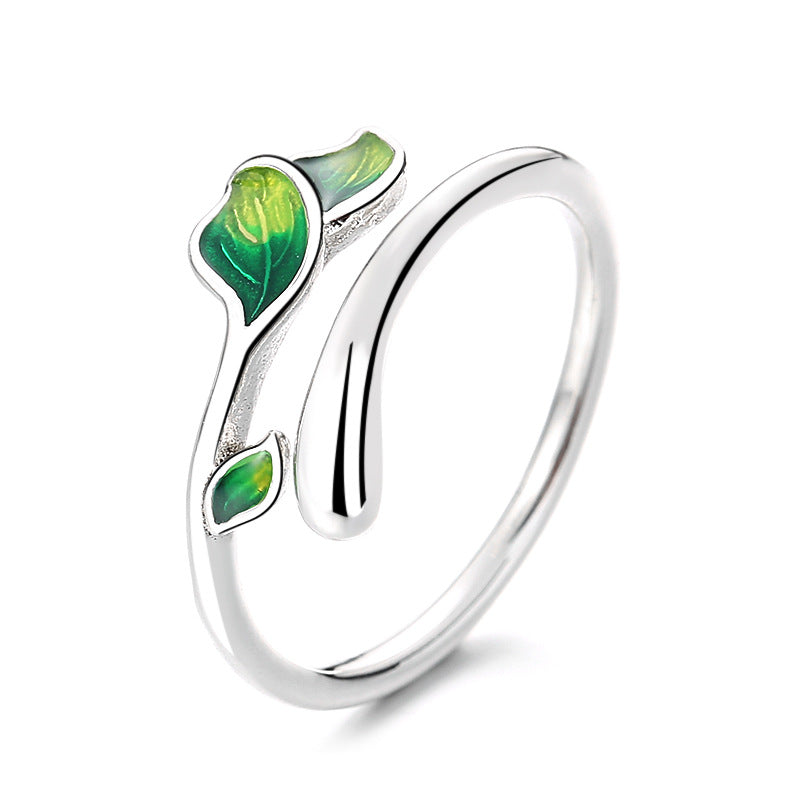 Origsoul silver olive leaf ring with green enamel detailing on a minimalist open band