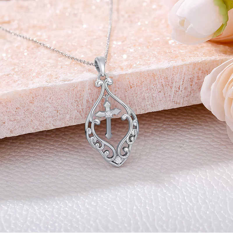 Origsoul ornate heart cross necklace in silver with intricate scrollwork and a hanging chain
