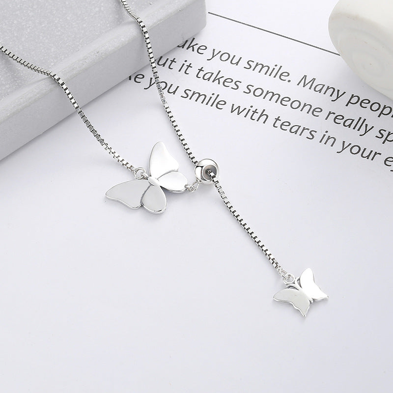 Origsoul delicate butterfly pendant jewelry in silver with adjustable chain on white background