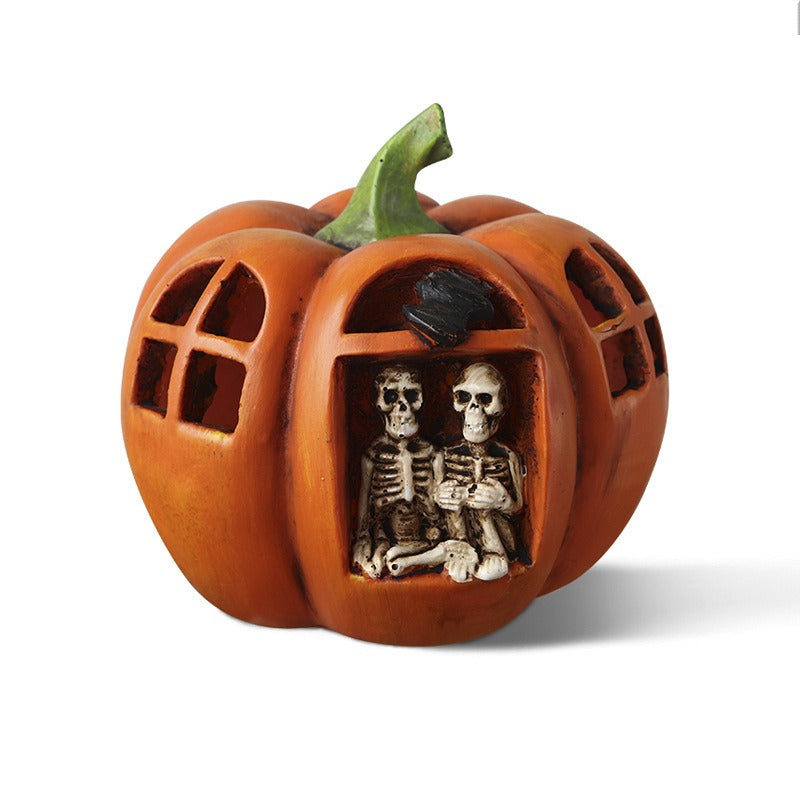 Origsoul resin haunted house pumpkin with skeletons sitting inside carved pumpkin windows