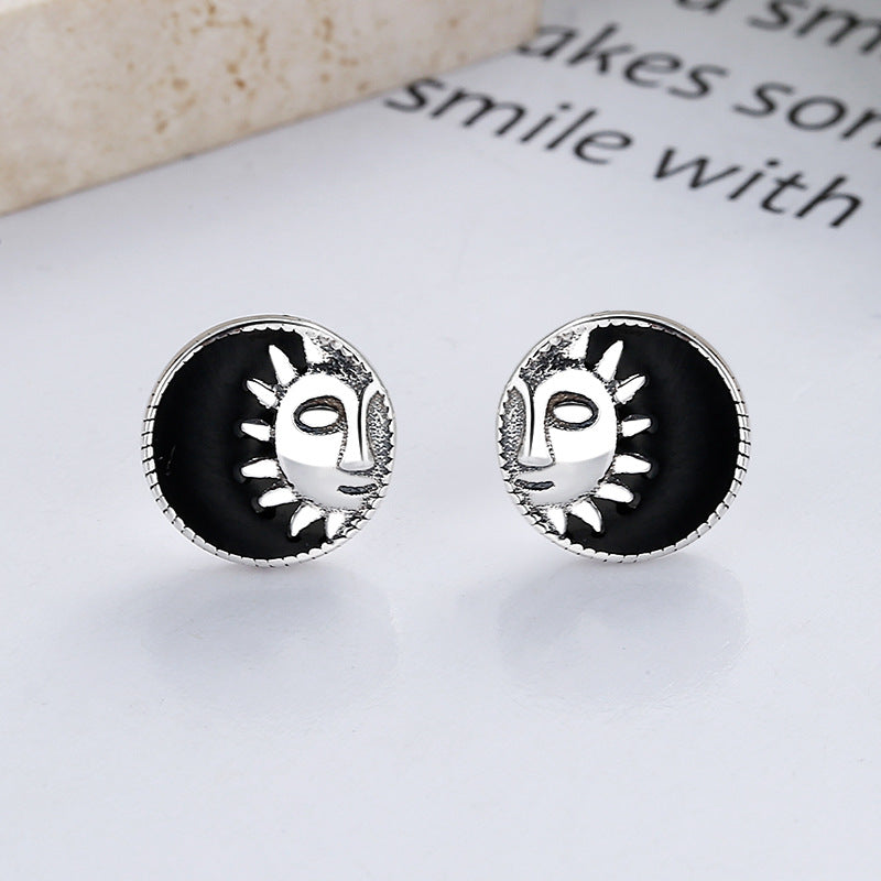 Origsoul retro black enamel earrings with cosmic sun and moon design in silver tone