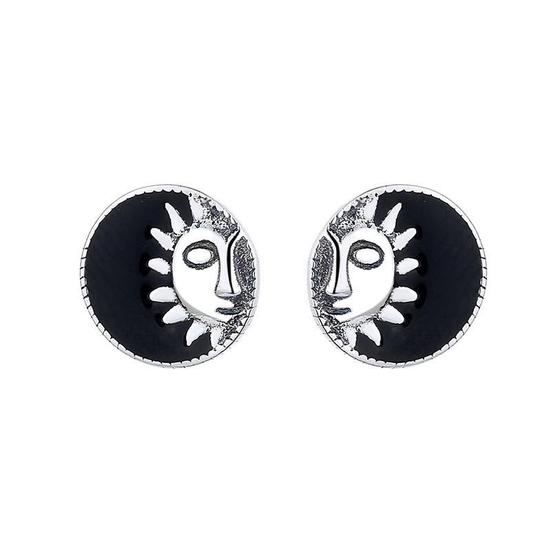 Origsoul retro black enamel earrings featuring cosmic sun and moon face design in silver-tone