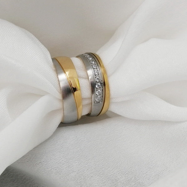 Origsoul gold and silver everyday wear rings for couples with diamond accents on white fabric