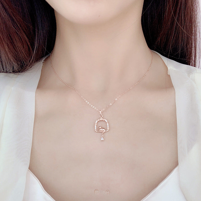 Origsoul delicate rose gold cat necklace worn on neck with simple chain and cat pendant