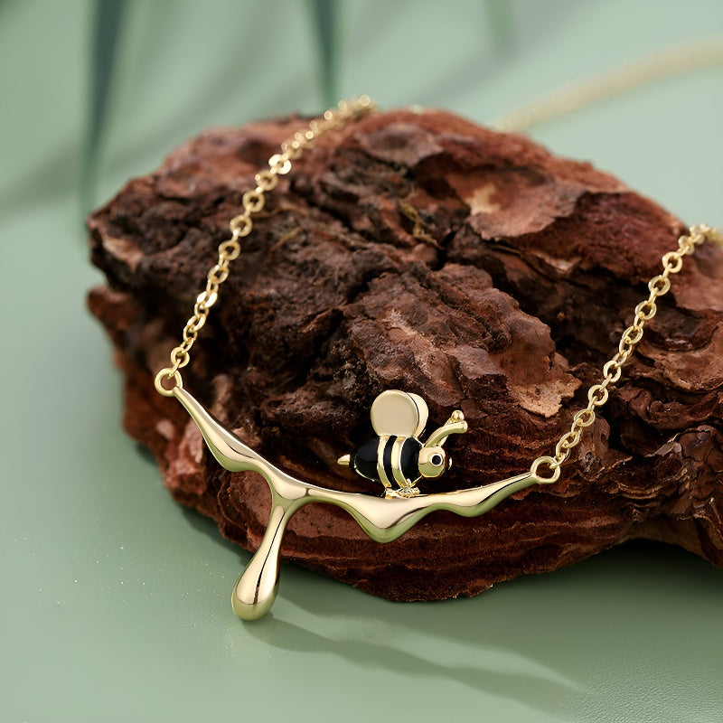 Origsoul S925 sterling silver bee necklace with a unique honey drip design and detailed bee charm