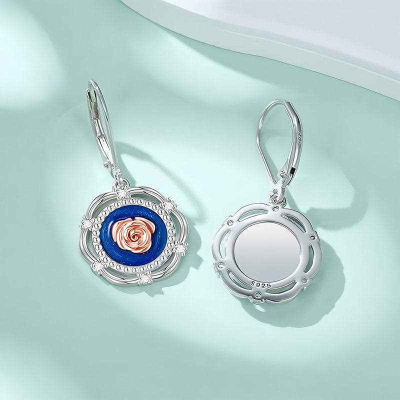 Origsoul S925 sterling silver rose earrings with intricate floral design and vibrant blue background