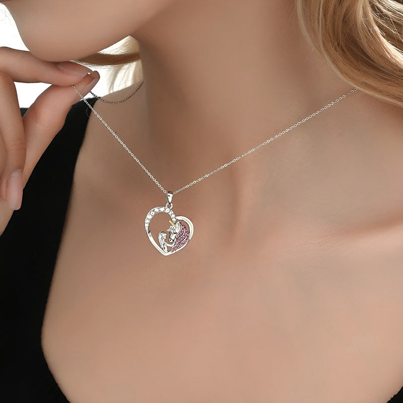 Origsoul S925 sterling silver unicorn necklace with heart pendant worn on a model