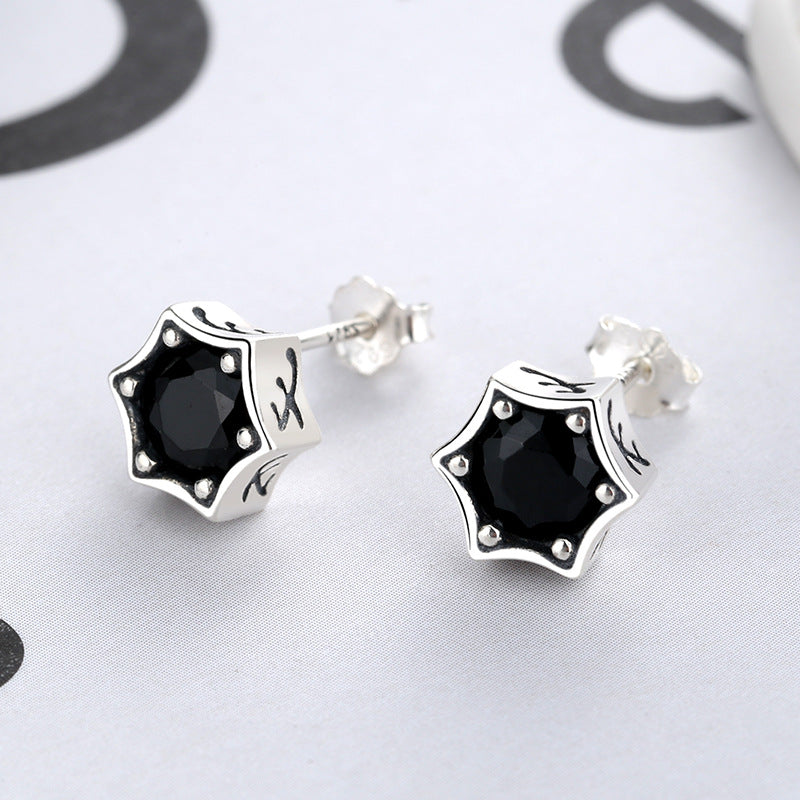 Origsoul cosmic star stud earrings with black gemstone set in silver metal design