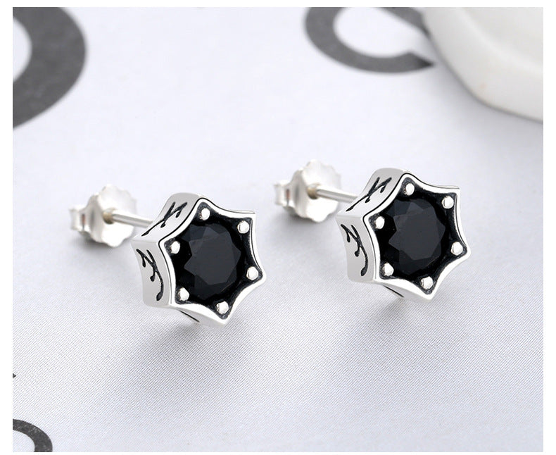Origsoul cosmic jewelry star stud earrings with black gemstone and silver star-shaped design