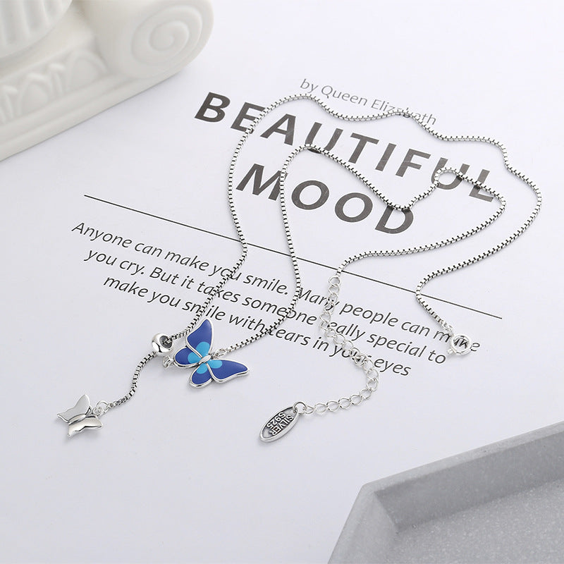 Origsoul delicate butterfly pendant jewelry with blue and silver design on silver chain necklace