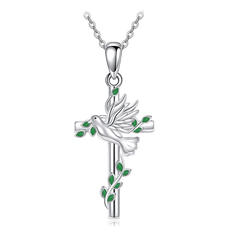 Origsoul dove and cross pendant necklace in silver with green leaf accents on a chain