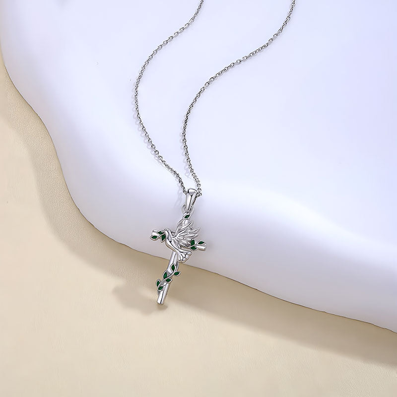 Origsoul dove and cross pendant necklace in silver with green enamel accents on a thin chain