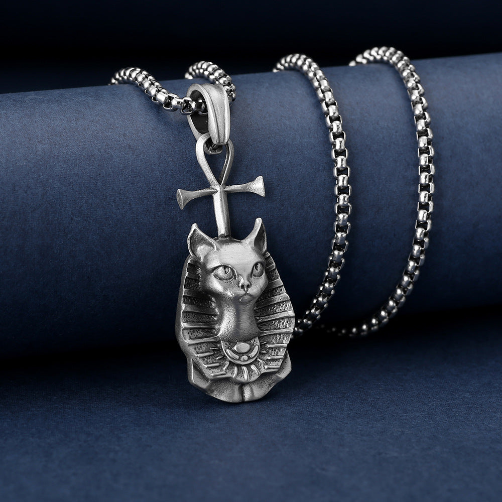Origsoul silver Egyptian cat necklace with ankh pendant on a box chain against dark blue background