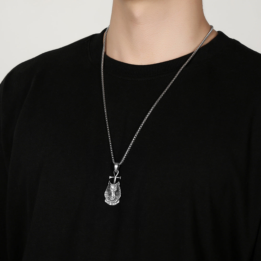 Origsoul Egyptian cat necklace in silver worn on a chain over a black shirt