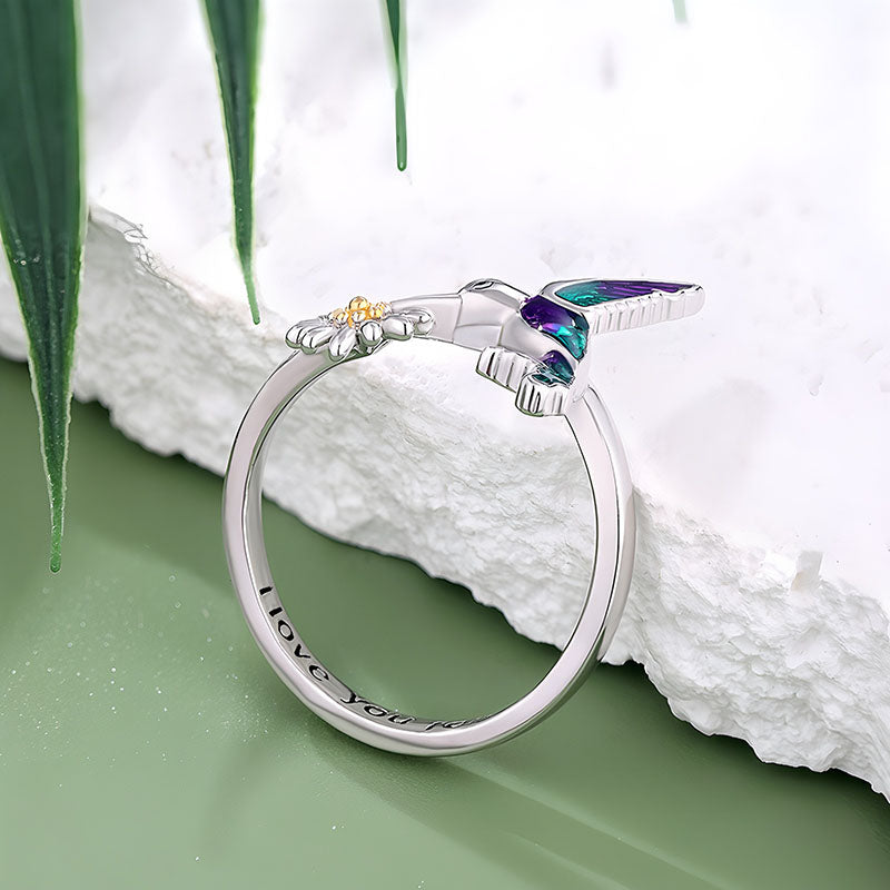 Origsoul hummingbird flower ring in silver with colorful enamel hummingbird and detailed flower design