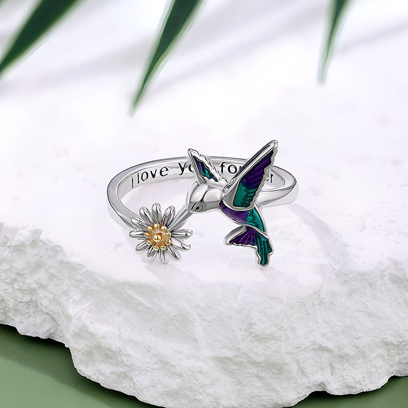 Origsoul hummingbird flower ring in silver with colorful hummingbird and daisy design