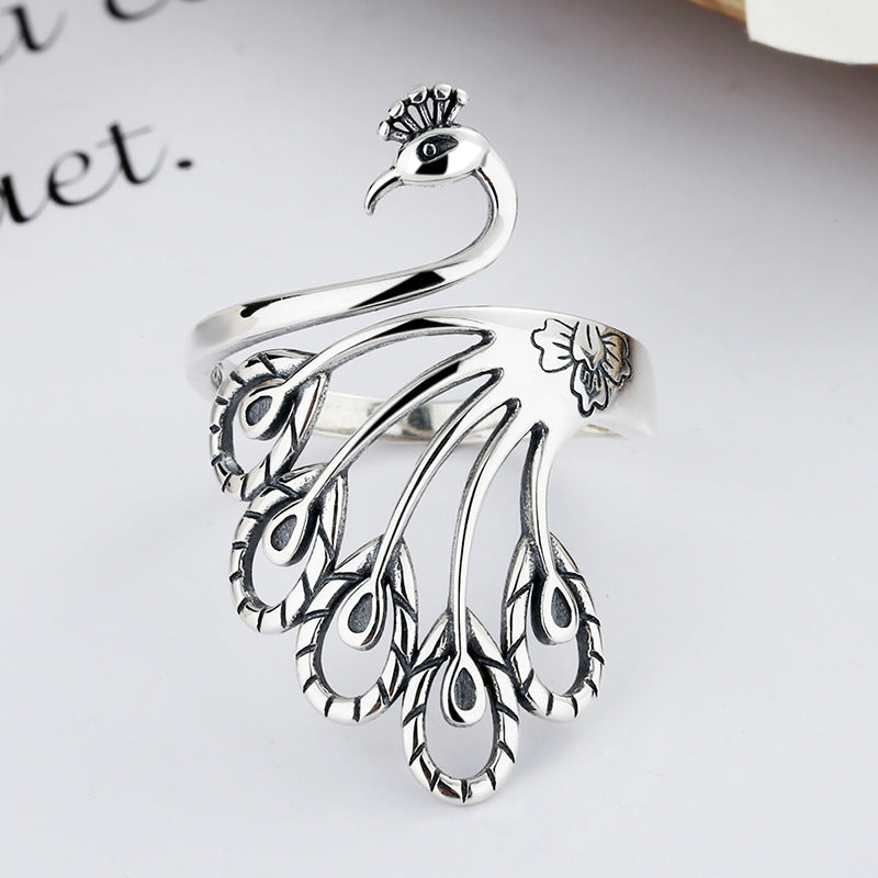 Origsoul silver peacock adjustable ring for women with intricate feather design and open band
