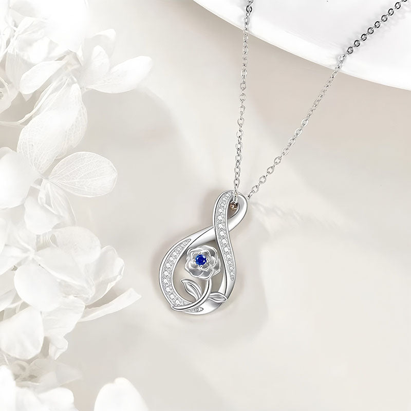 Origsoul elegant silver September birthstone necklace with blue gemstone and floral design pendant