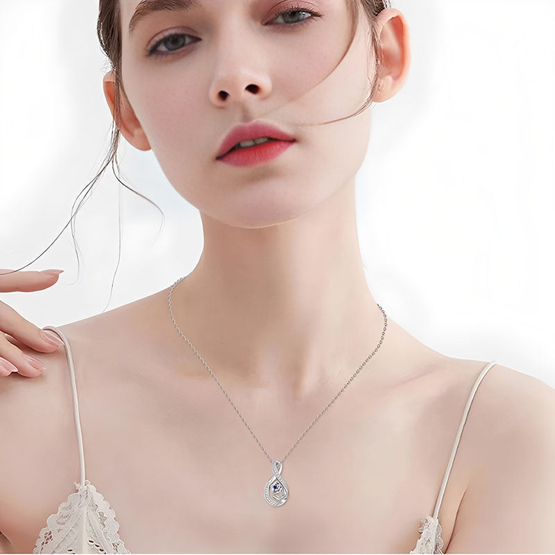 Origsoul elegant silver September birthstone necklace worn by woman with delicate pendant