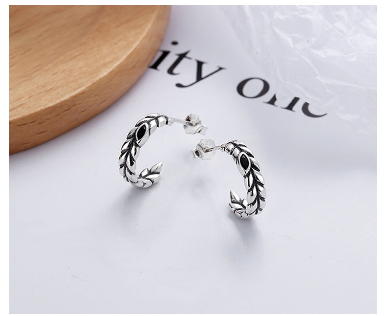 Origsoul silver wheat hoop earrings with intricate leaf design on white background